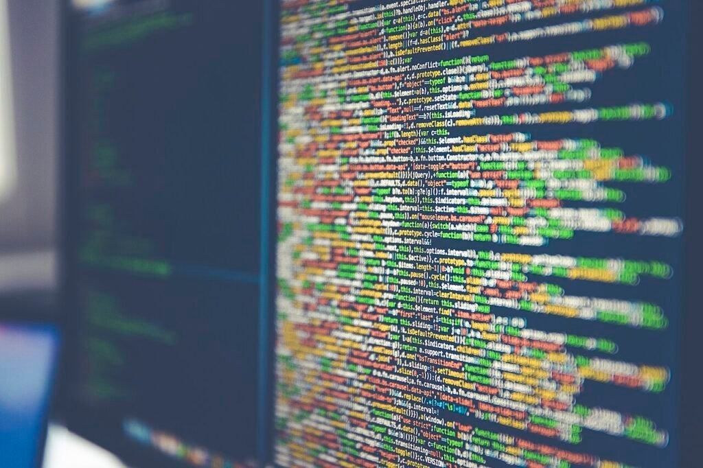 File:Code on computer monitor (Unsplash).jpg